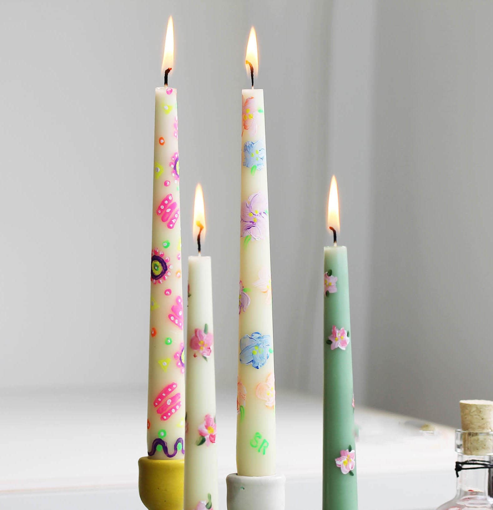 painting candles with wax