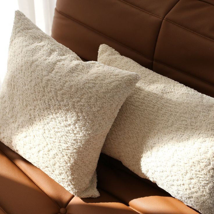 Light-colored throw pillow