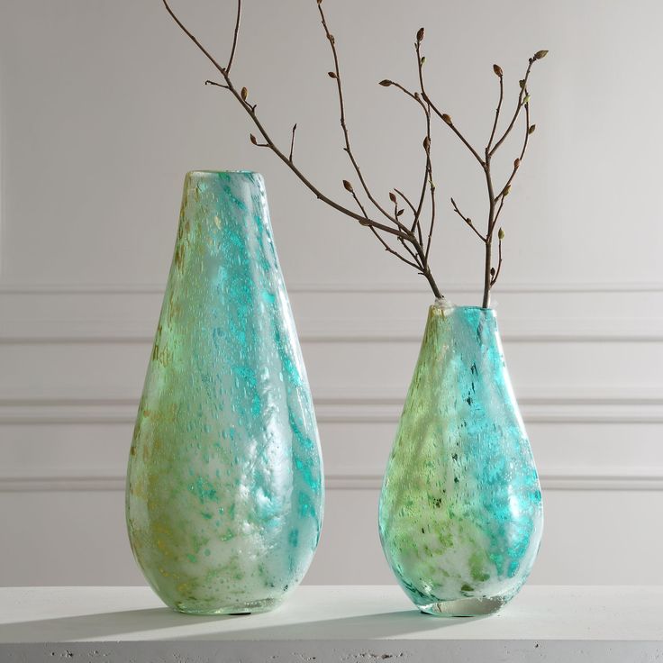 Teal-hued vases